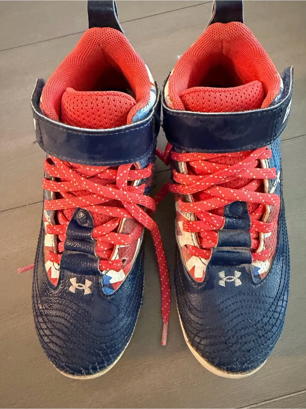 Under Armour Kids' Navy and Red High-Top Cleats for Sports